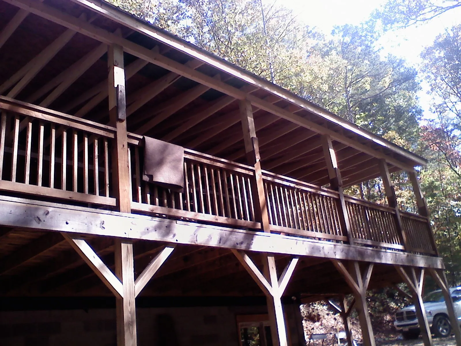 Timber framing under a new elevated porch and deck — Roof Leak Repair in Linthicum Heights by Roofing Brothers